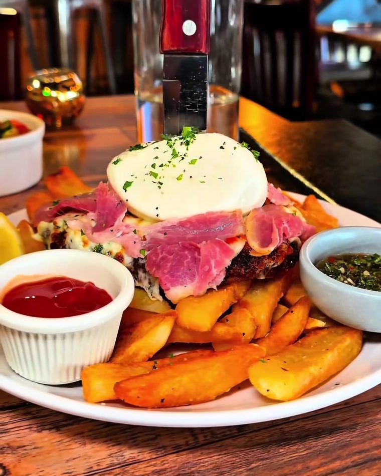 Chivito with fries and sauces