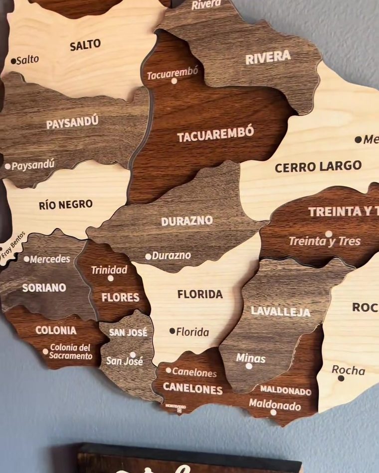 A wooden map of Uruguay on the wall of the restaurant