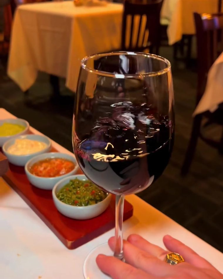 A glass of red wine on the table
